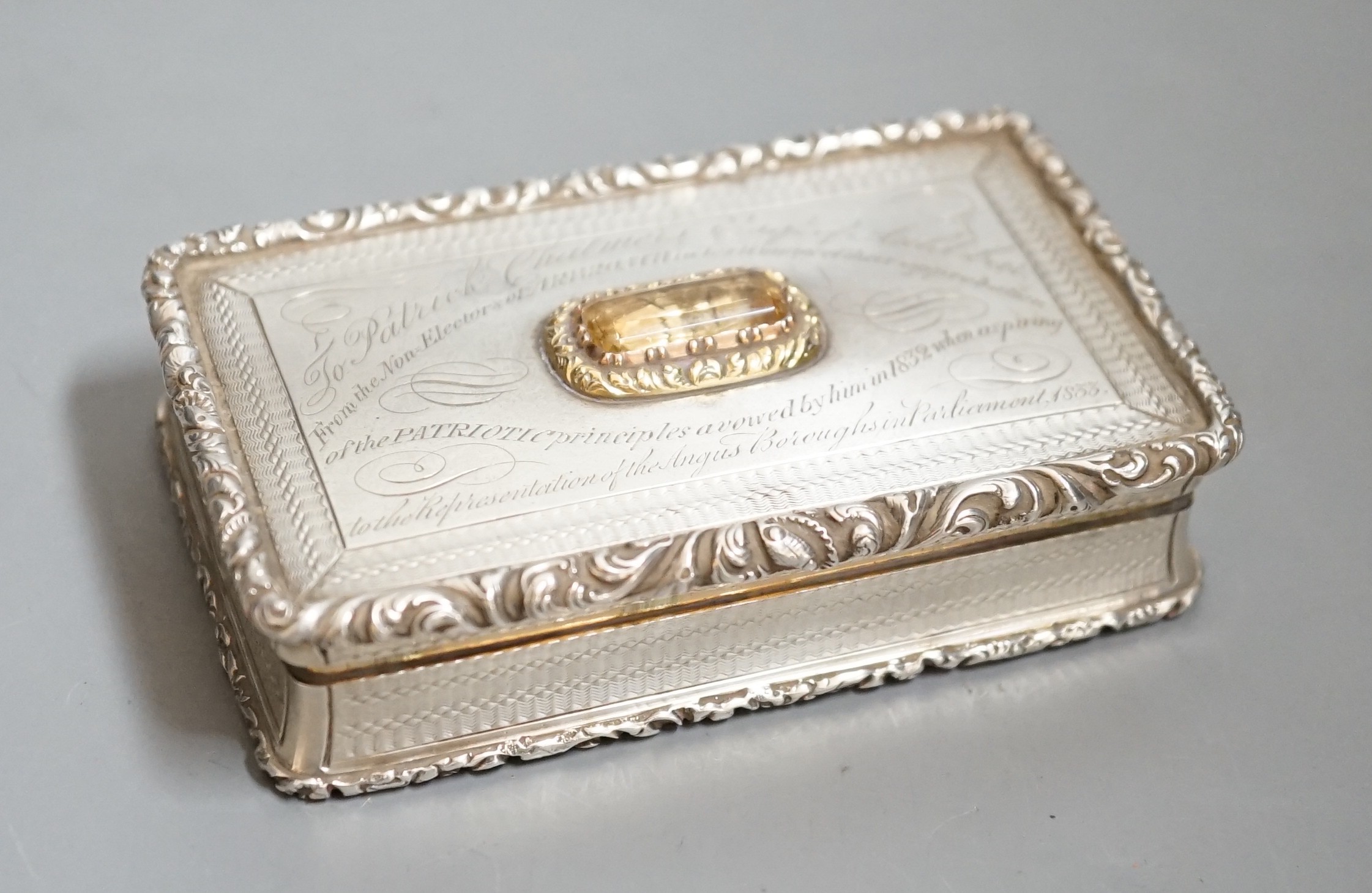 A William IV silver and citrine mounted rectangular snuff box, by Nathaniel Mills, Birmingham, 1830, with engraved inscription, 83mm.